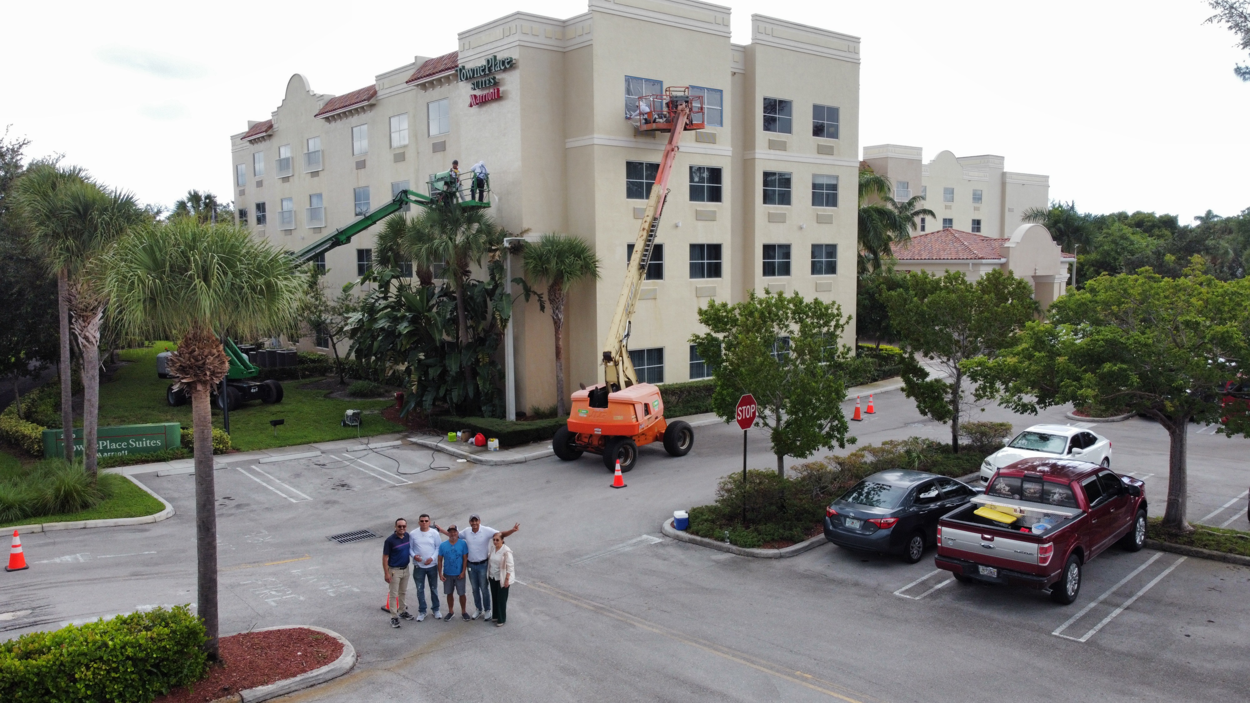 Aerial view hotel exterior painting crew Miami