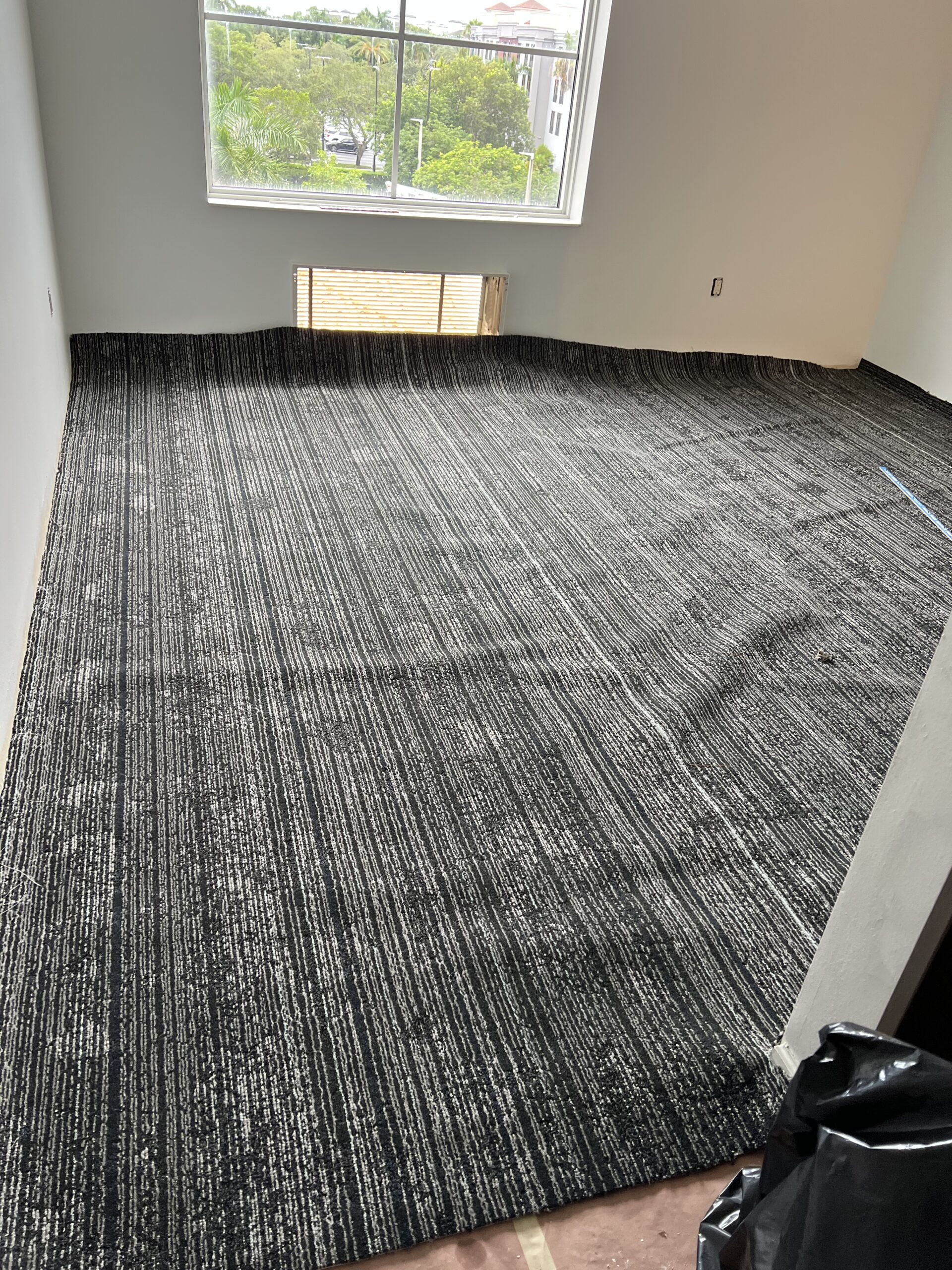 Hotel carpet roll installation Miami renovation