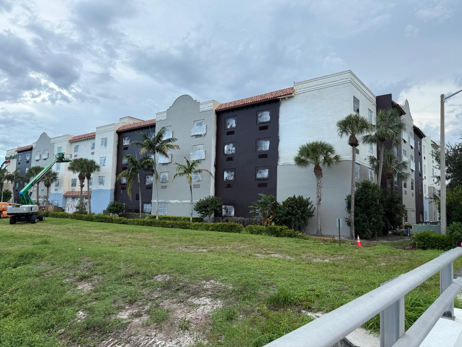 Occupied hotel exterior painting contractor Florida